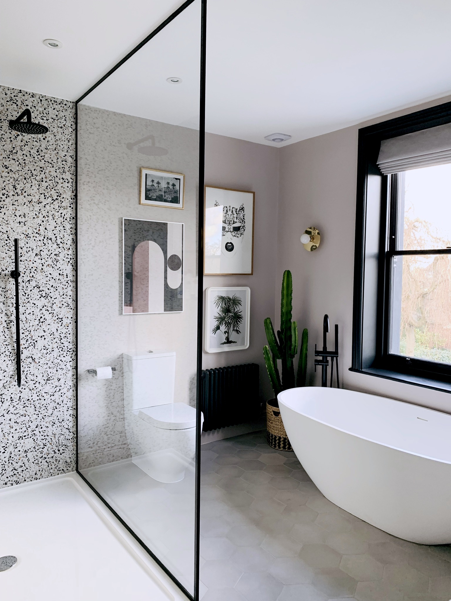 Trinity House bathroom with terrazzo shower and freestanding bath